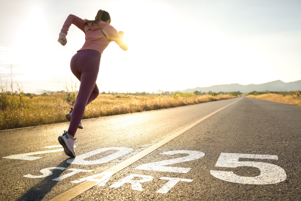 Woman racing from a 2025 start line