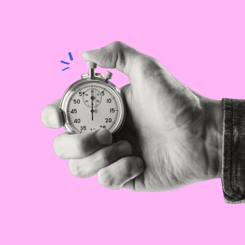 A hand holding a stop watch in grey scale